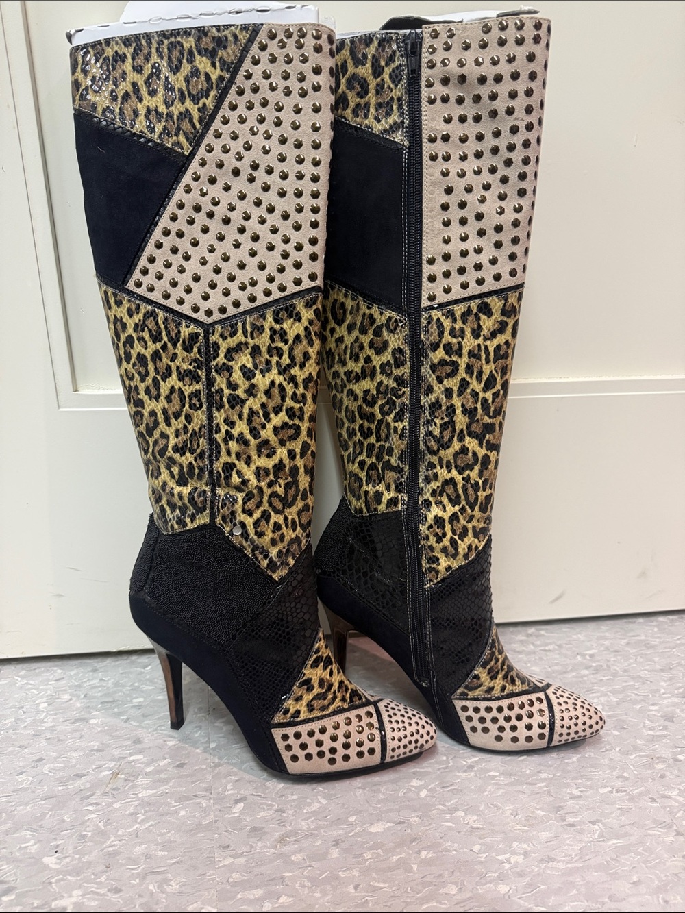 Showstopping Carlos Santana Regal Leopard Patchwork Heeled Boots